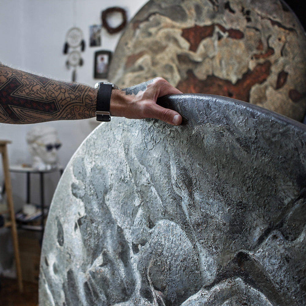 Konstyantyn Lyzogub in his studio in Kharkiv, Ukriane, close-up photo of his artwork