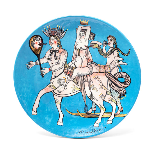Decorative plate with artistic depiction of a woman on a horse against a blue background