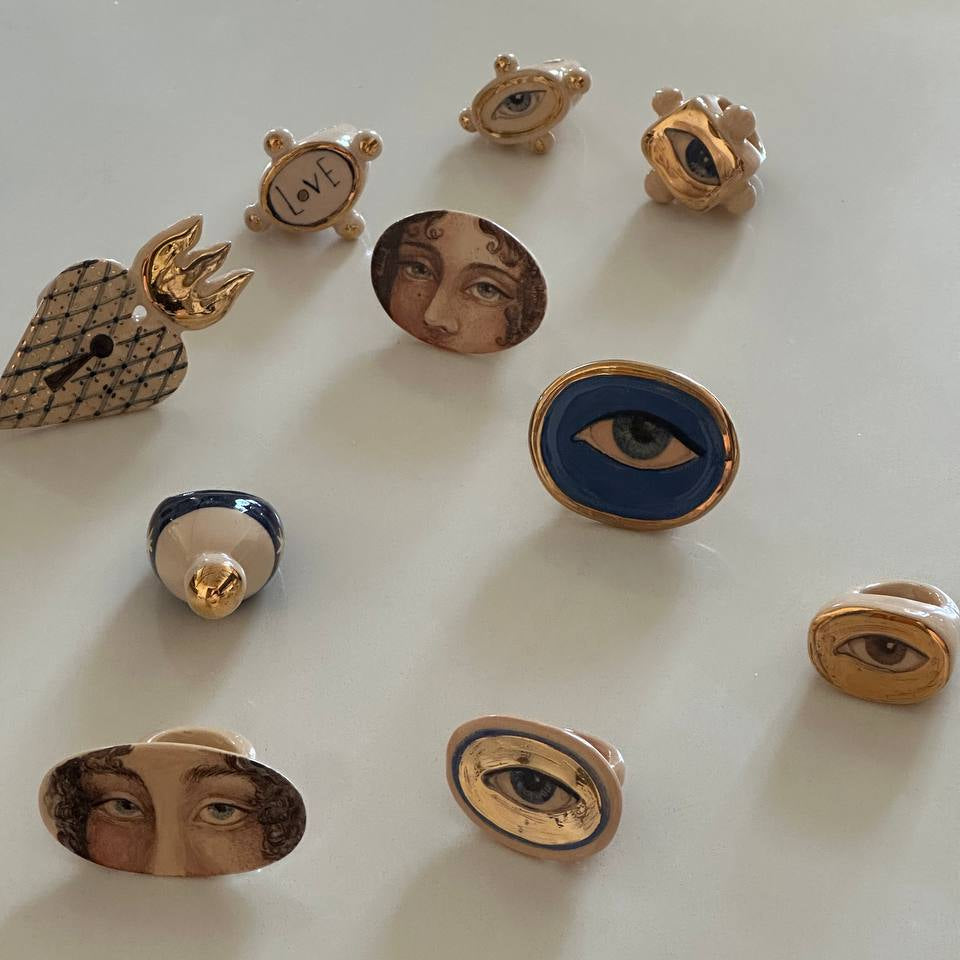 Collection of unique earrings on a white background