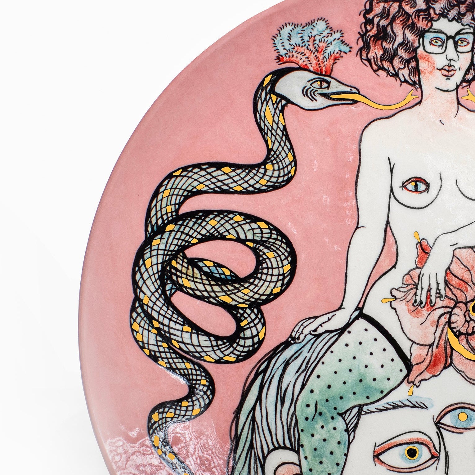 Decorative plate with artistic design of a woman with snakes and a face on a pink background by Nina Murashkina