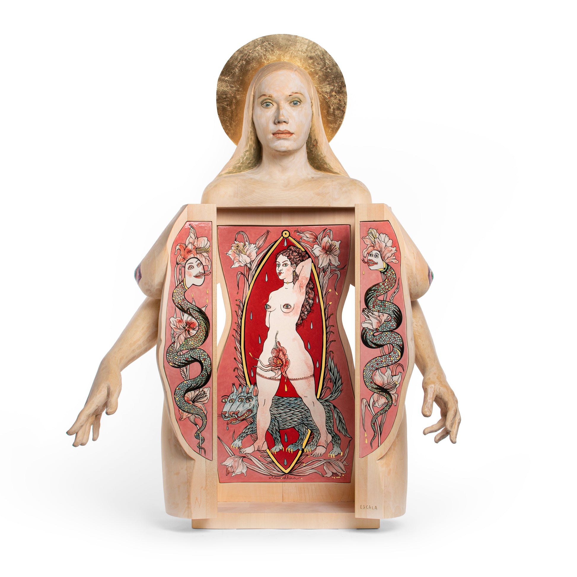 Wooden sculpture of a woman with a central panel featuring a nude figure and snakes, on a white background.