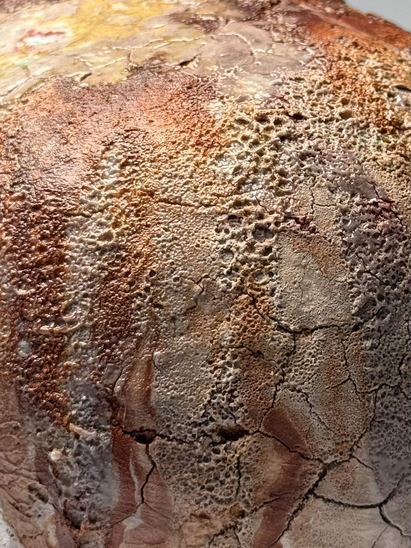 Close-up of decorative ceramic vase with textured surface 