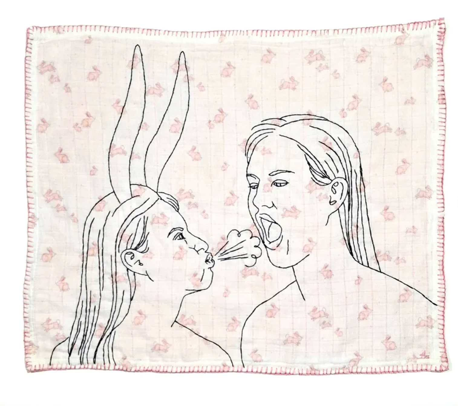 Blanket with line art of two faces and a flower on a floral patterned background