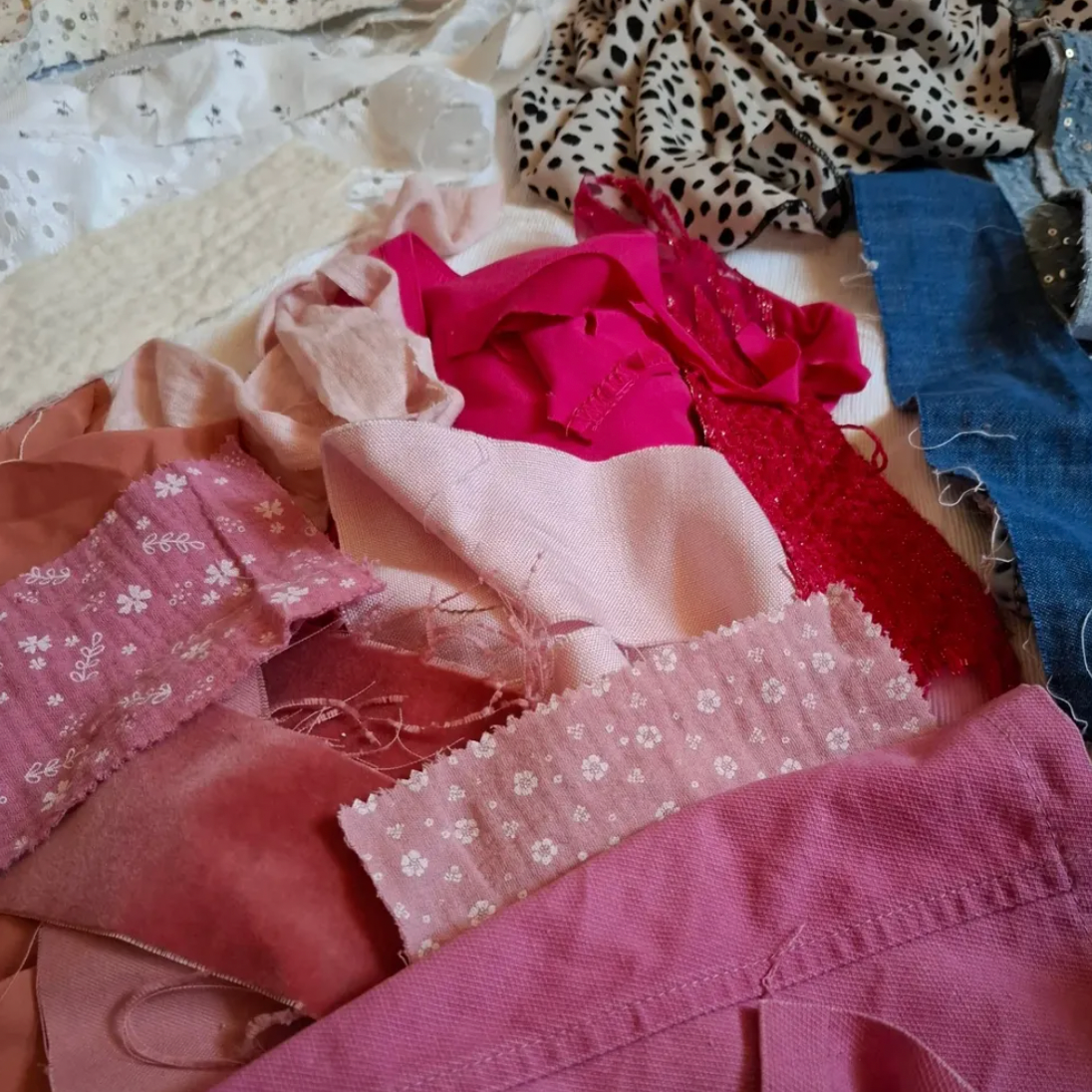 Collection of various fabric swatches in different colors and patterns.