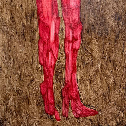 Red legs in boots on a textured brown background