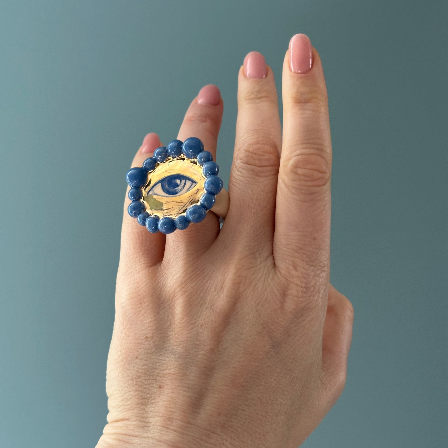 the ceramic elegant ring 4 on the hand by Yuliia Pylypchatina