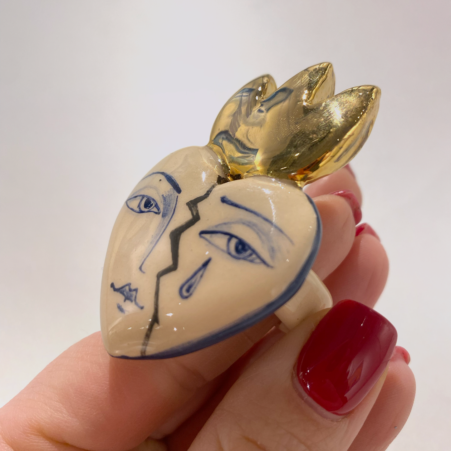 elegant ceramic ring in a shape of heart by Ukrainian Yuliia Pylypchatina