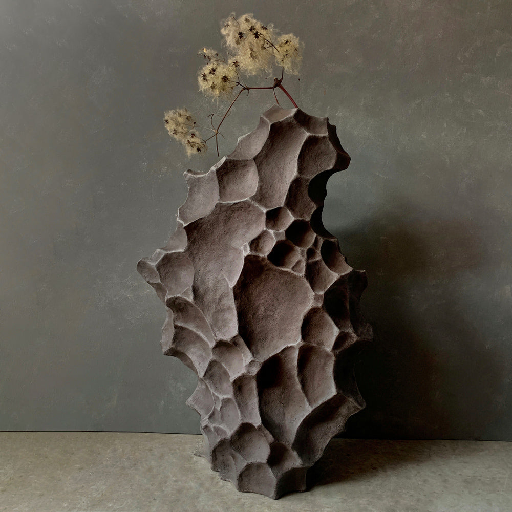 Contemporary ceramic vase in organic sculptural form with natural earth-toned glaze by NaturaCeramica