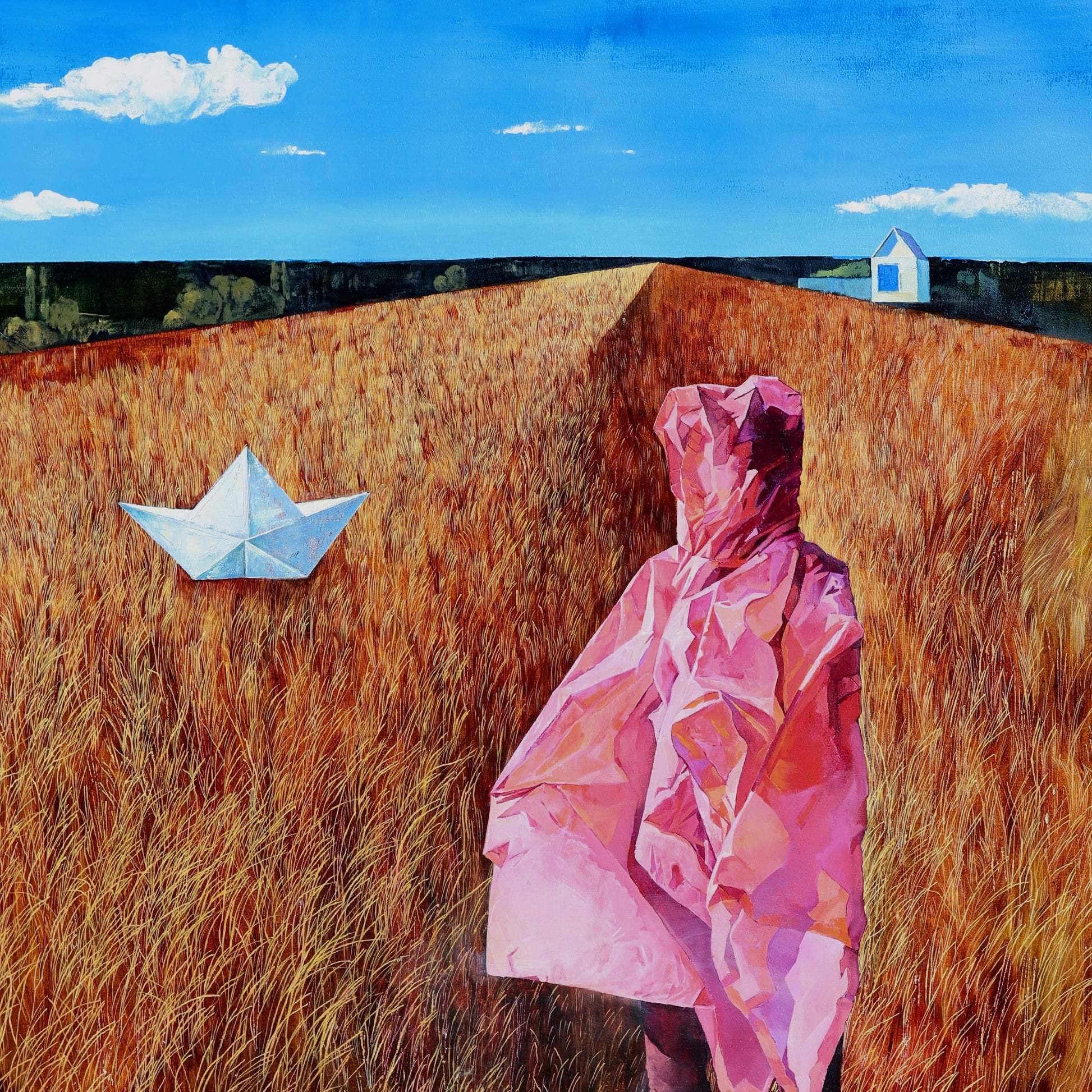 Close up of Person in a pink raincoat standing in tall brown grass with a paper boat in the air.