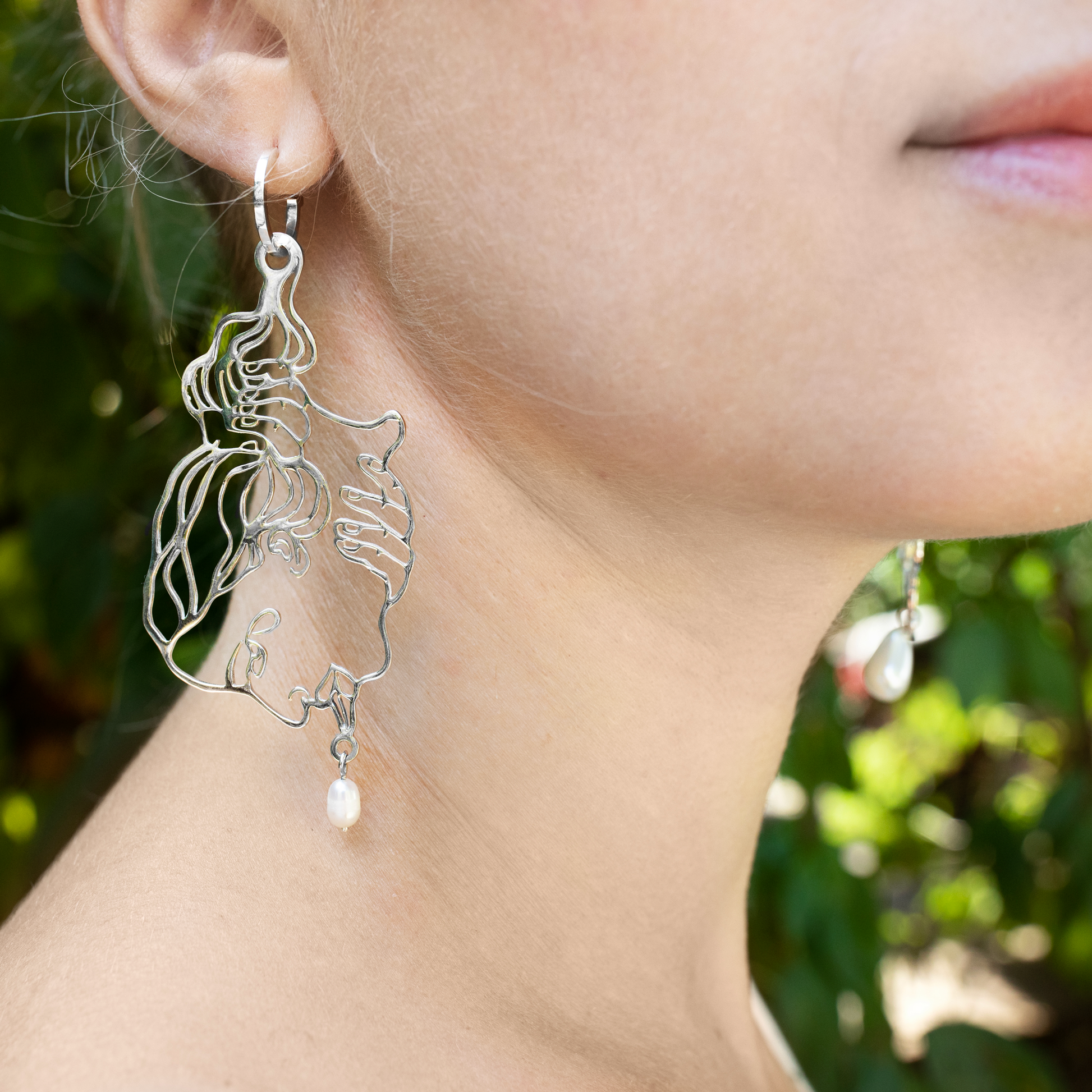 Silver earring with pearl by Nina Murashkina